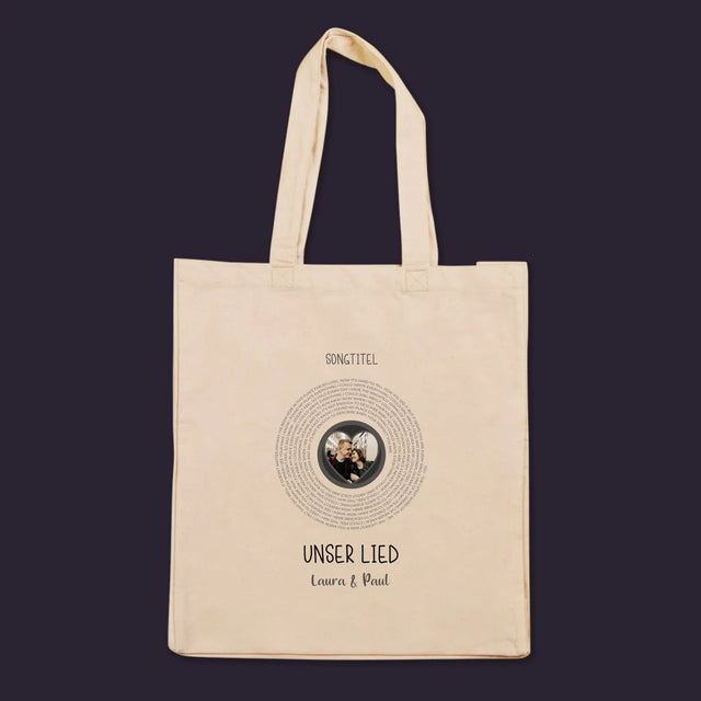 Foto und Bildunterschrift: Unser Lied mit Text – Canvas-Tasche | DE