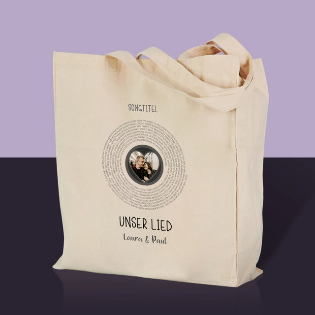 Foto und Bildunterschrift: Unser Lied mit Text – Canvas-Tasche | DE
