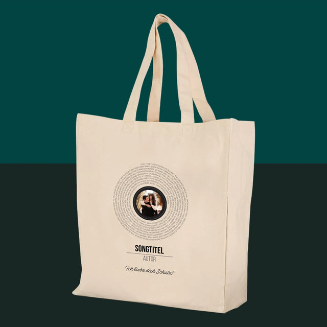 Foto und Bildunterschrift: Songtexte auf der CD – Canvas-Tasche | DE