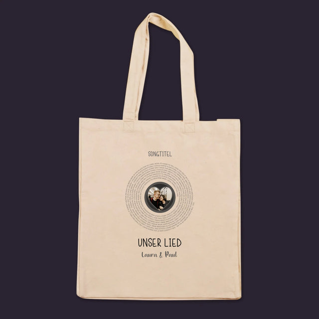 Foto und Bildunterschrift: Unser Lied mit Text – Canvas-Tasche | DE