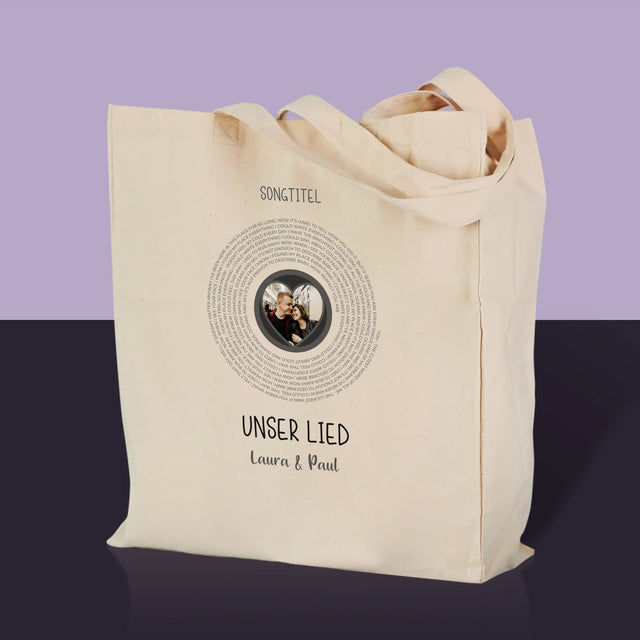 Foto und Bildunterschrift: Unser Lied mit Text – Canvas-Tasche | DE
