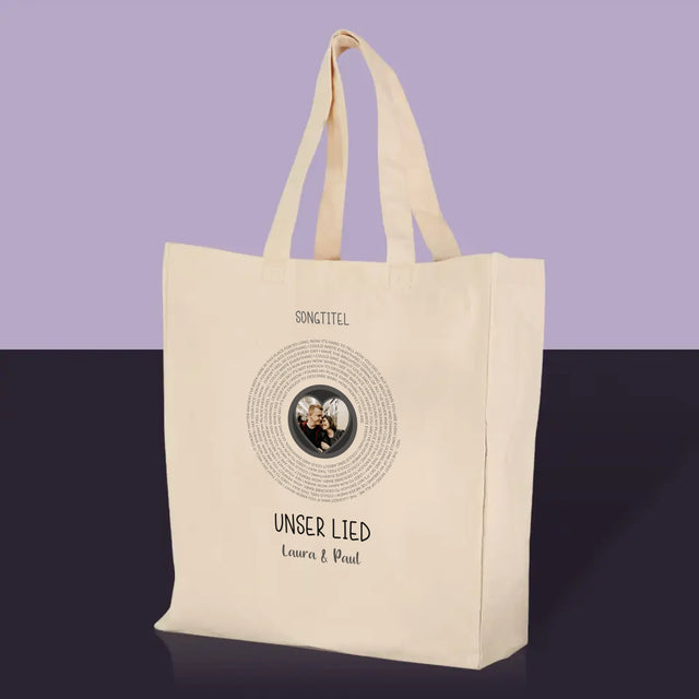 Foto und Bildunterschrift: Unser Lied mit Text – Canvas-Tasche | DE